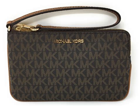 replica michael kors wristlet|michael kors large wristlet clutch.